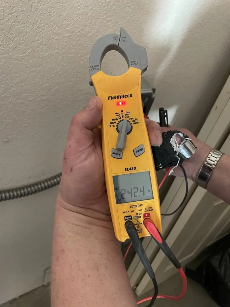 Voltage testing with clamp meter during Hot Tub / Pool Electrical Wiring in Fort Shawnee
